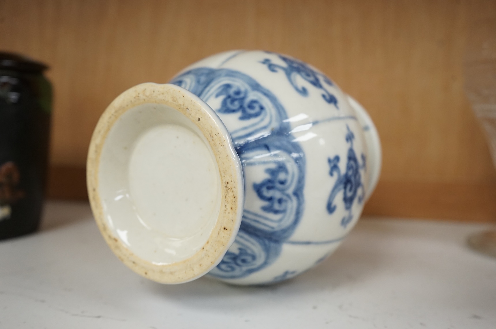 A Chinese blue and white pomegranate shaped vase, 18cm high